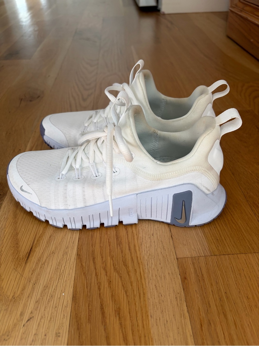 Nike Women’s Metcon White Athletic Sneakers with Light Blue Accents